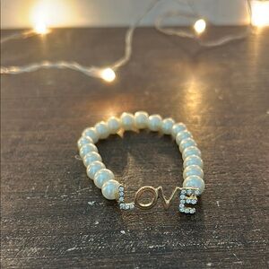 Elegant Pearl Bracelet with Gold and Silver Accents